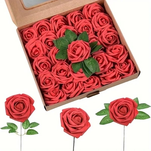 Detailed view of red PE foam roses in a gift box with green leaves and wire stems