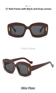 Detail of red square sunglasses with thick temples and oval gold metal hardware accents