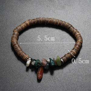 Detail shot of bohemian natural stone and coconut shell bead bracelet with dimensions