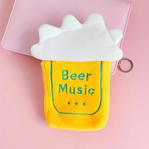 Close-up of yellow beer mug plush pouch with Beer Music embroidery and metal key ring