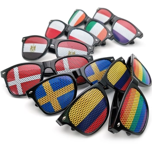 Close-up of kaleidoscopic party sunglasses featuring diverse national flags on mesh lenses