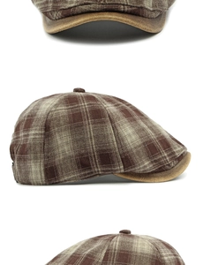 Detalle de gorra de vendedor de periódicos vintage a cuadros con visera de cuero marrón