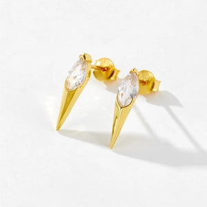 Detailed view of S925 silver stud earrings with marquise zircon and gold spike accents