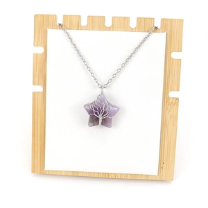 Star-shaped purple crystal stone necklace with silver tree of life wire wrap pendant