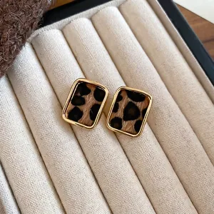 Vintage gold-plated rectangular leopard print earrings with warm flocking texture