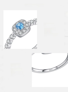Detailed macro view of S925 sterling silver stamp and blue square halo zircon ring