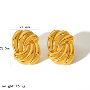Detailed size view of irregular gold twisted earrings measuring 21.2mm by 28.5mm
