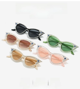 Close-up of cat-eye sunglasses with luxury rhinestone frames in five stylish colors