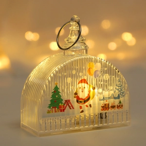 Close-up of LED Christmas lantern featuring Santa Claus and warm holiday lighting