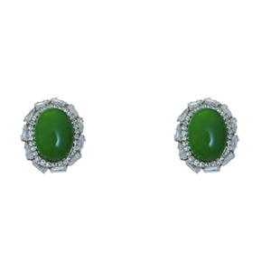 Vintage oval emerald green acrylic earrings with cubic zirconia halo in silver setting