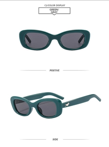 Detail of green oval sunglasses with silver star decor and side view display