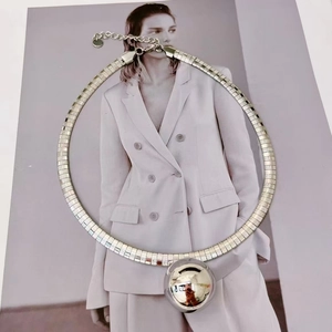 Chic gold and silver snake chain choker with large spherical pendant for professional women