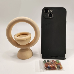Vertical wooden essential oil diffuser ring with crystal stones and phone for scale