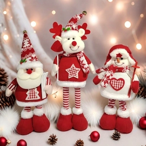 Christmas plush dolls set with Santa Claus, Reindeer and Snowman on festive background