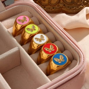 Set of 5 18K gold plated stainless steel enamel butterfly rings in a pink jewelry box