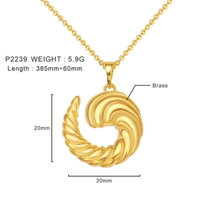 Macro shot of gold brass twist pendant with detailed measurements and product weight info