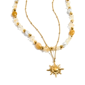 Double-layered sun pendant necklace with gold beads, pearls and yellow stones