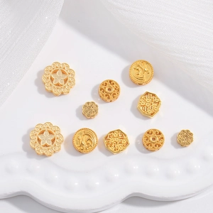 Detailed macro shot of golden S925 silver hollow flower beads for DIY jewelry making
