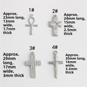 Detailed comparison of four stainless steel cross pendants with specific size measurements