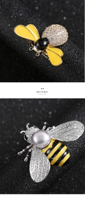 Macro detail of bee brooches with enamel craft, sparkling zircons, and elegant grey pearls