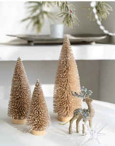 Mini champagne sisal Christmas trees and gold reindeer figurine festive tabletop decor