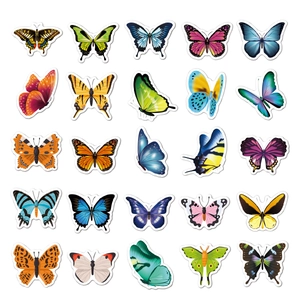 Detailed view of 25 colorful butterfly stickers with white borders for scrapbooking