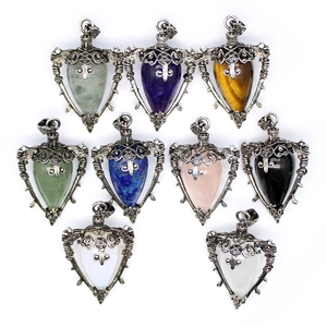 Nine diverse natural stone crystal pendulum pendants with silver metal star design