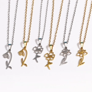 Row of 18k gold and silver plated stainless steel necklaces with birth month flower pendants