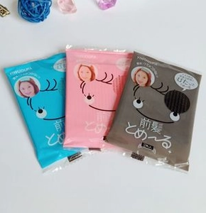 Detailed view of 2-piece fringe magic hair stickers in pink, blue, and gray colors