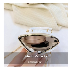 Internal view of white mini woven shell bag showing compact capacity for cosmetics