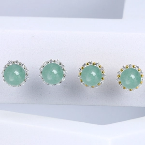 Elegant S925 silver flower stud earrings with green jade stones and sparkling zircon pavé