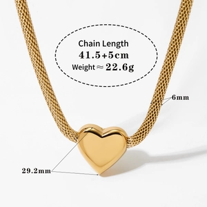 Close-up of gold chunky mesh chain necklace with heart pendant and size specifications