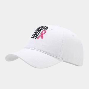 Close-up of white cotton baseball cap with Pink Ribbon and Never Give Up embroidery