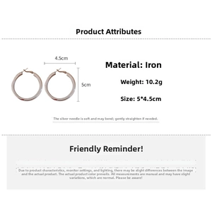 Detailed view of large silver metal hoop earrings showing 5cm size and 10.2g weight