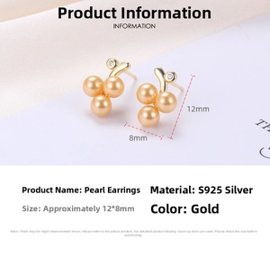 Macro shot of 925 sterling silver grape-shaped earrings with gold shell pearls and zircon