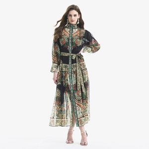 Vintage paisley print lantern sleeve dress with waist belt and bohemian floral pattern