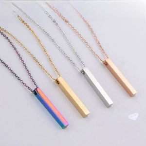 Detailed view of titanium steel bar pendants in rainbow, gold, silver, and rose gold finishes