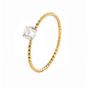 Minimalist 18k gold twist rope band ring featuring a single sparkling diamond stone