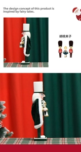 Detail of a 30cm wooden nutcracker king featuring a green velvet cloak and white fur trim