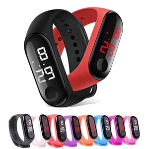 Macro detail of multi-color LED sports watches with soft silicone wristbands
