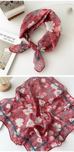 Detailed view of red floral cotton linen scarf with elegant French vintage artistic print