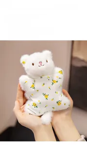 Close-up of white plush bear pendant with floral pattern and scented particle filling