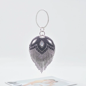 Spherical silver diamond evening clutch bag with fringe tassels and metal handle