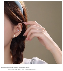 Detail of s925 silver blue butterfly earring with high-quality multilayer plating finish