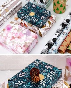 Detail of floral and botanical patterns on premium gold-stamped gift wrapping paper