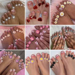 Japanese silicone toe separators with floral designs like daisy and rose for nail art