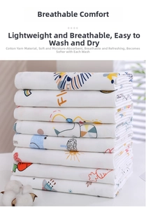 Detailed view of layered cotton baby muslin squares with cute lion and rainbow prints