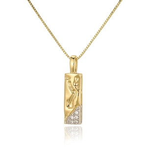 Detail of gold pendant necklace with irregular texture and pavé set cubic zirconia
