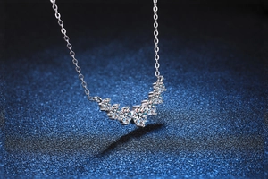 Detailed view of S925 silver necklace with sparkling D color moissanite curved pendant