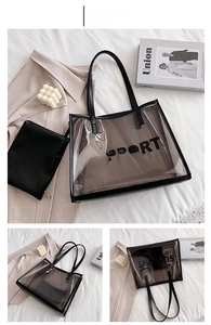 Detail of coffee PVC transparent tote bag with SUPPORT text and black inner pouch